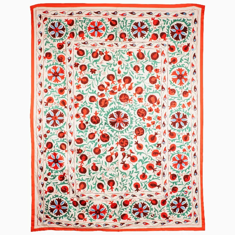 Cotton blankets for breathability and a lightweight feelBusy Garden Suzani Blanket