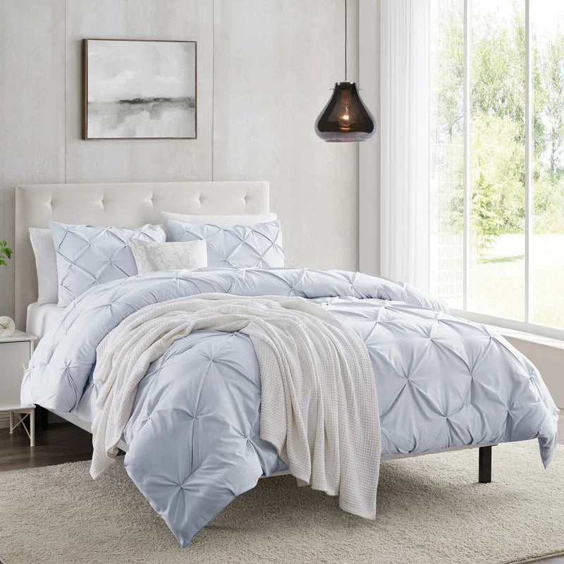 Goose down comforters known for their superior quality and insulationPintuck Comforter - Ice Blue