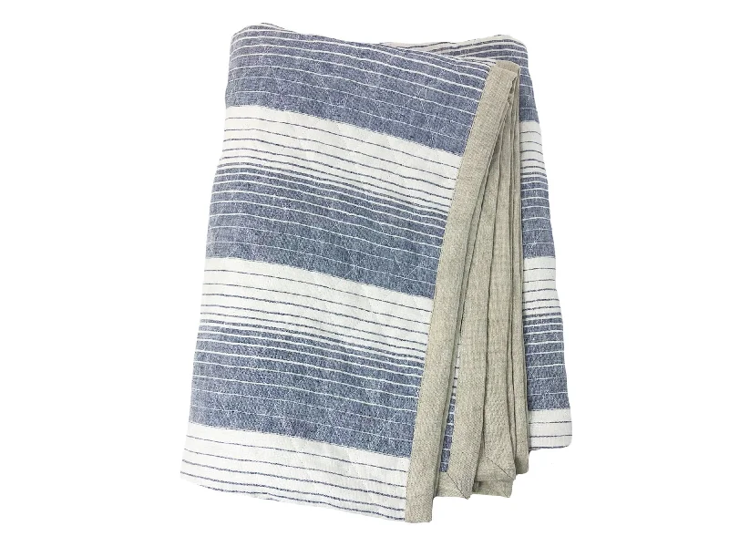 Linen blankets with a rustic and textured lookQuilted Linen Throw in Cortina Blue