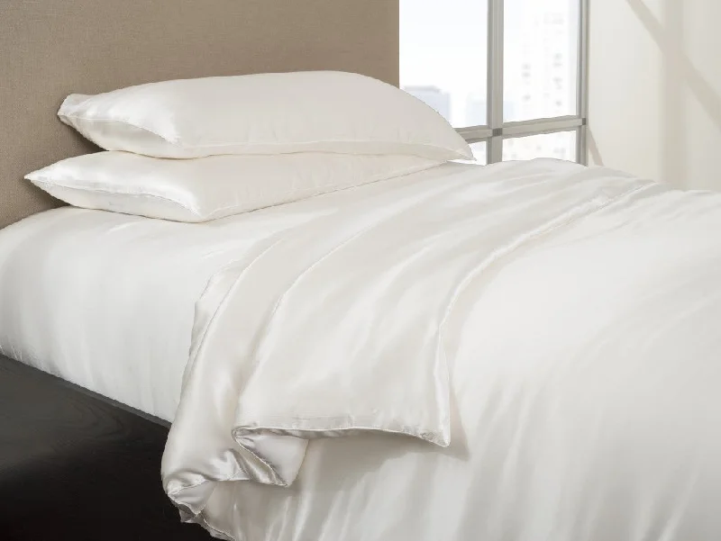 Synthetic - filled comforters like polyester for affordability and hypoallergenic propertiesSilk-Filled Comforter with Silk Cover